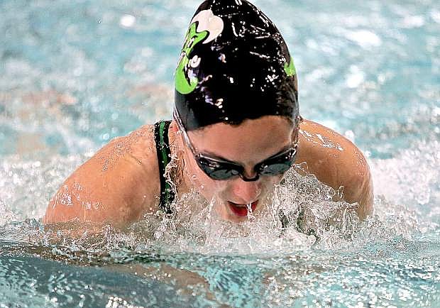 Sophomore Ashby Trotter warms up for the Greenwave Friday at the Carson Valley Swim Center.