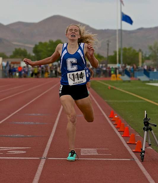 Carson&#039;s Abigail Pradere wins the girl&#039;s 4A 1600-meter run Friday during the NIAA State Championships at the Jim Frank Track and Field Complex.