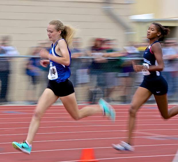 Carson&#039;s Abby Pradere leads Centennial&#039;s Alexis Gourrier in the 4A girls 800-meter run Saturday at the NIAA State Track and Field Championships at Carson High.