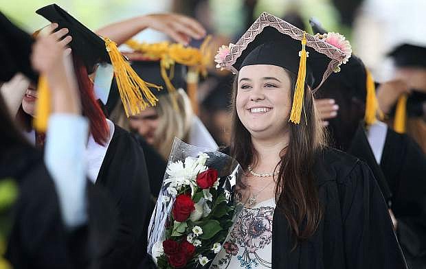 Nursing graduate Alexandra Dodge enjoys the 2018 Western Nevada College Commencement Ceremony on Monday in Carson City. Nursing students were also honored later that day with a traditional pinning ceremony.