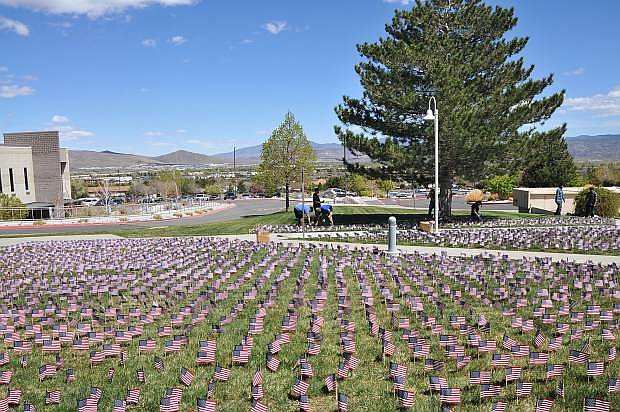 Students planted flags on Wednesday and Thursday in preparation for the fourth annual Veterans Suicide Awareness March at WNC. The event raises awareness about the 22 veteran suicides that occur each day in the U.S. and the local services available to help veterans. The 2018 march is set for Saturday at 10 a.m.