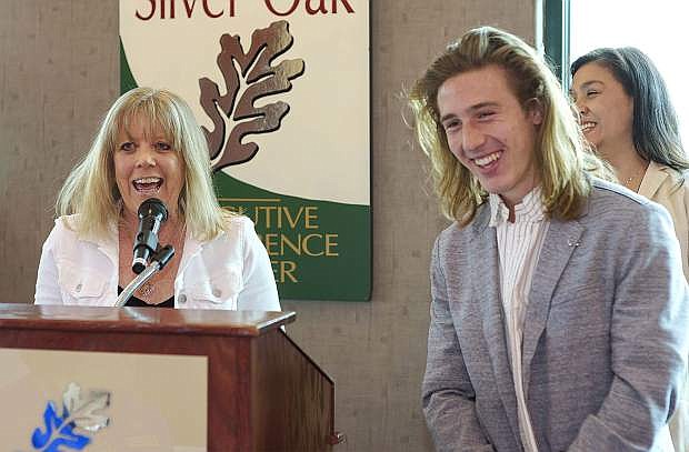 Western Nevada College Jump Start coordinator Tricia Wentz recognizes Adam Radow, 17, during the the Associated Students of Western Nevada Awards and Appreciation reception on Saturday, May 12, 2018. Dozens of students, faculty and staff members were honored in the annual ceremony at Silver Oak Golf Course. Photo by Candice Vivien/Nevada Momentum