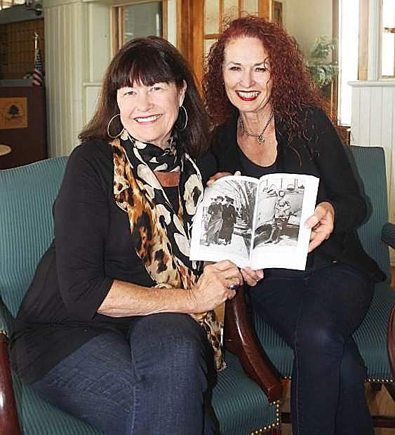 Michon Mackedon, left, and Valerie Serpa display a book on Fallon which was written in 2014. Bunny Corkill assisted Mackedon and Serpa with research and photos.