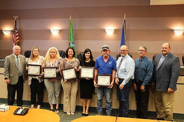 Churchill County Commissioners stand with some of the Service Award winners on Wednesday.