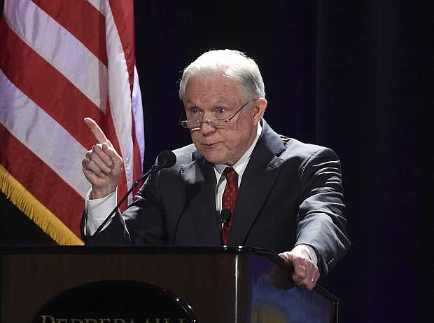 U.S. Attorney General Jefferson Sessions talks about immigration at the NASRO School Safety Conference at the Peppermill Resort on Monday, June 25, 2018, in Reno, Nev. (Andy Barron /The Reno Gazette-Journal via AP)