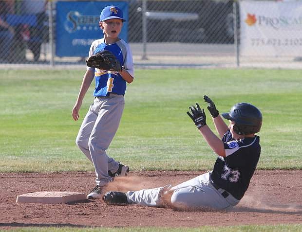 Ryker Russel steals second base against South Lake Tahoe in a 10&#039;s division game on Monday.