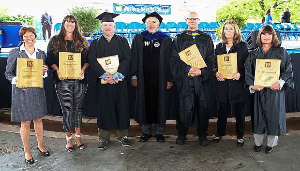 Former employees are honored with emeritus status by Acting President Mark Ghan (center) before the 2018 Western Nevada College Commencement Ceremony on May 21. From left are Anne Hansen, Andrea Doran, Gil Martin, Ken Sullivan, Deborah Case and Kristie Gangestad. Linda Whitehill and Richard Finn aren&#039;t pictured.