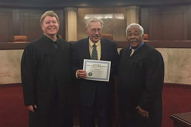 The Supreme Court of Nevada recognized Senior Judge Archie E. Blake (center) for his 30 years of service to Nevada.