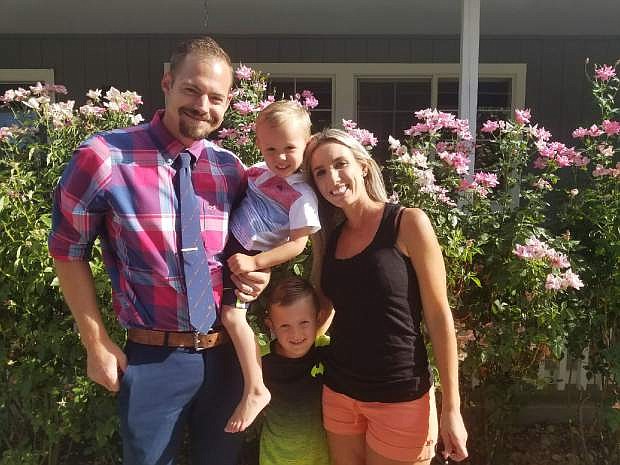 Fallon native Blake Cooper, pictured here with wife Corinne and their two sons, recently accepted the position as principal at Yerington Elementary School.