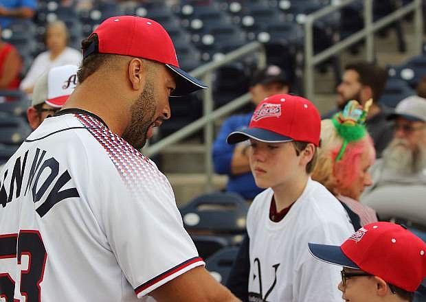 New England Patriots linebacker Kyle Van Noy meets with fans before the Reno Aces-Las Vegas 51s baseball game.