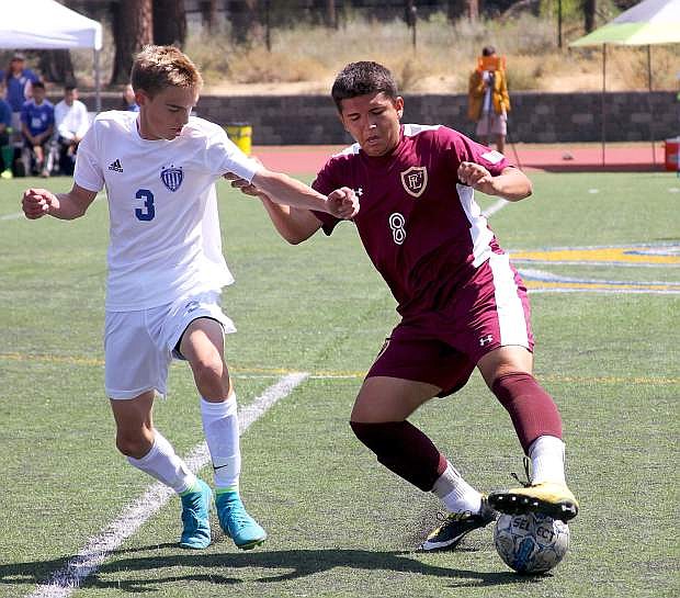 Carson&#039;s Kaden Walt defends during a game last Friday at the South Tahoe Invitational.