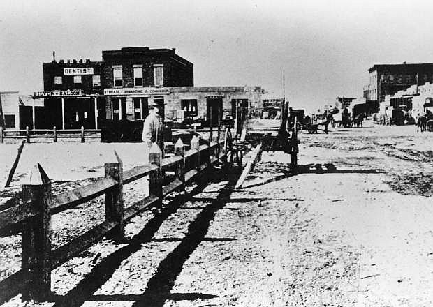 Daun Bohall Collection/Nevada State Museum Carson Street looking south from the southwest corner of the Capitol grounds before the iron fence was installed in 1875.