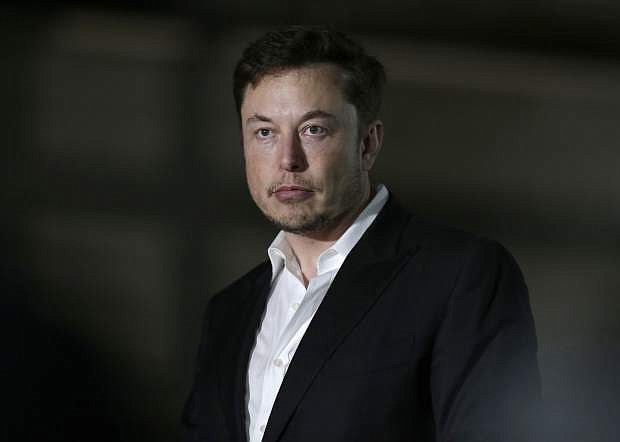 Tesla CEO Elon Musk speaks at a news conference in Chicago on June 14.