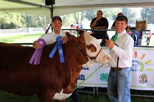 Lander Smith with his Grand Champion steer.