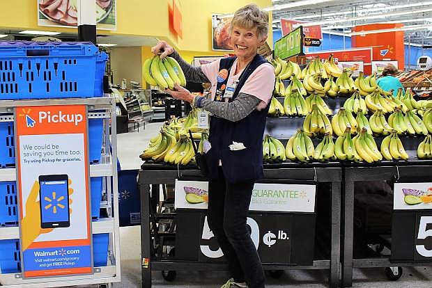 Johnelle Jackson, 78, has worked as a personal shopper for the Topsy Lane Walmart for a year.