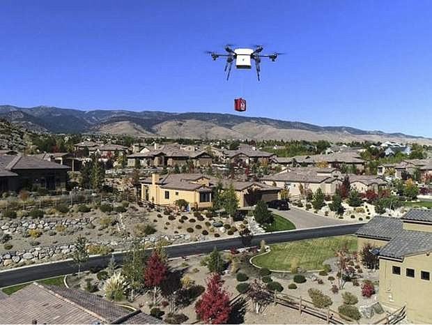 In this October 2017 photo, a Flirte delivery drone demonstrates the delivery of a defibrillator for cardiac arrest patients in Reno.