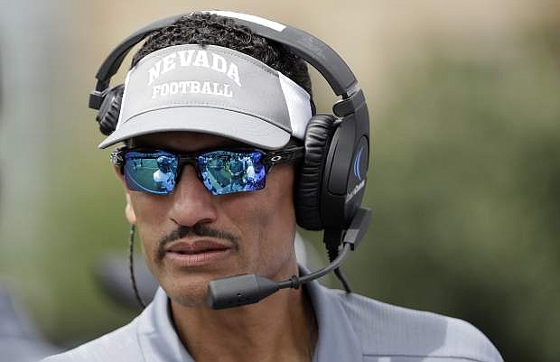 Nevada head coach Jay Norvell watches from the sideline in the first half of an NCAA college football game against Vanderbilt Saturday, Sept. 8, 2018, in Nashville, Tenn. (AP Photo/Mark Humphrey)