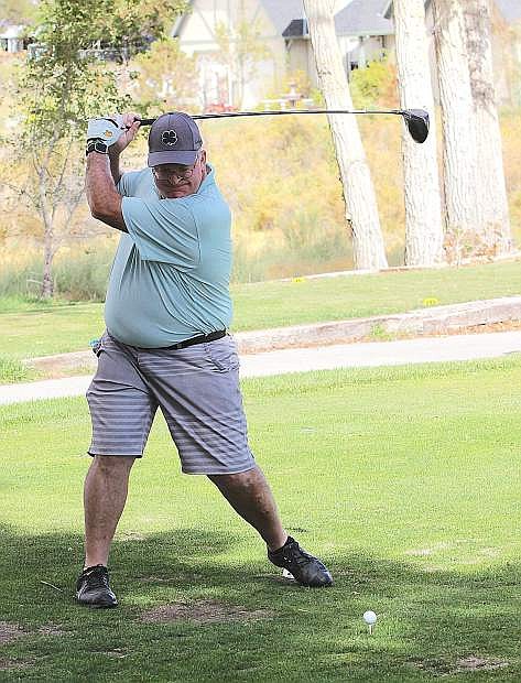 Alan Kalt takes his swing at the Jim Regan Memorial Golf Tournament.