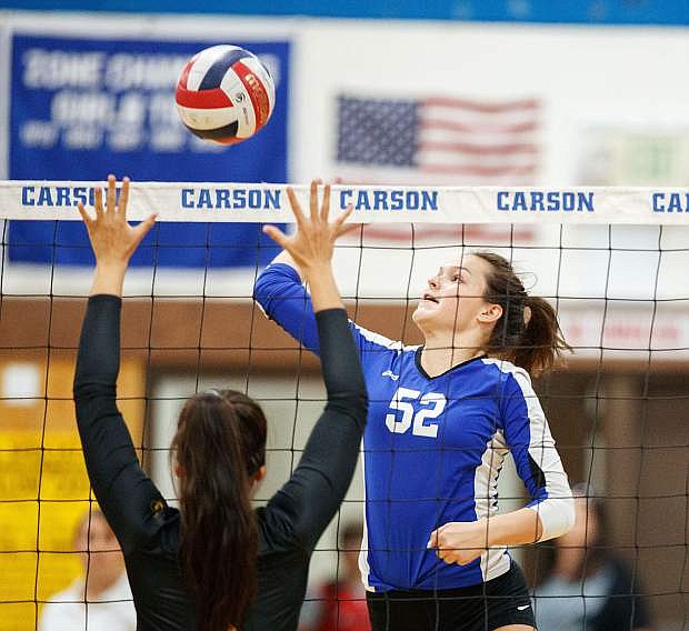 Senior Hitter Shea DeJoseph makes a play at the net during their match against Galena High on Thursday.
