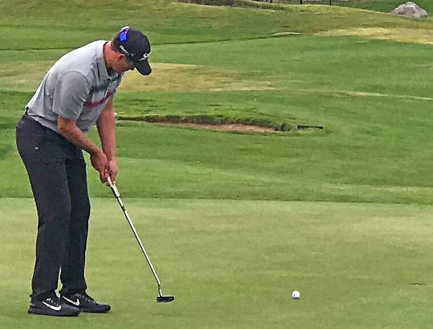 Kaleb Gorbahn putts at the Dayton Valley Golf Club.