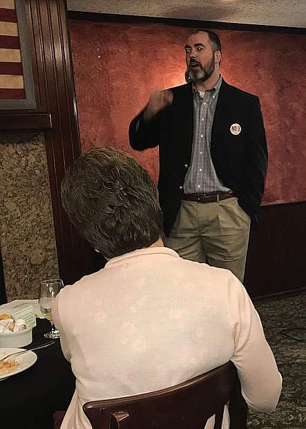 Mike Robertson, the Northern Nevada outreach coordinator for the Coalition to Defeat Question 3, talks at the monthly CEDA breakfast.