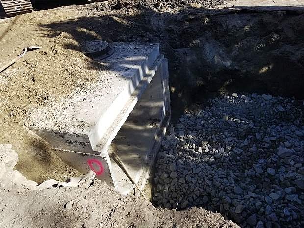 A large box culvert is being installed on Kings Canyon Road to increase capacity for water to flow into the creek rather than on the road during storm events.