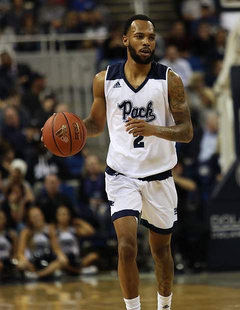Guard Corey Henson brings the ball upcourt for Nevada on Nov. 6 in Reno. The Pack beat BYU, 86-70, in the season opener for both teams.