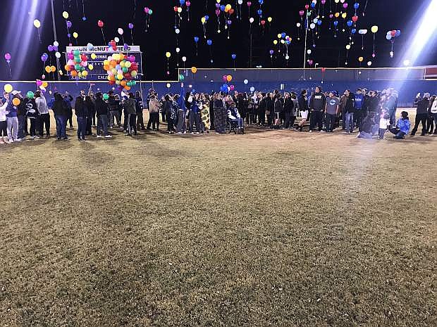 Those who participated in Monday night&#039;s service release their balloons.