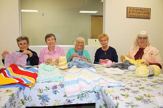 From left, La-Tea-Da members Barbara LeBlanc, Isobel Streenan, Margareta Sipma, Galeyn Molhar and Lee Ensminger have more than 300 years of collective knitting and crocheting experience between them.