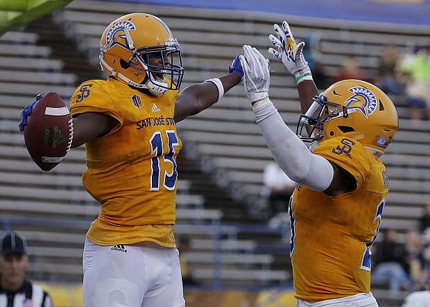 San Jose State wide receiver Tre Hartley, left, celebrates with running back Tyler Nevens after scoring a touchdown against UNLV on Oct. 27.