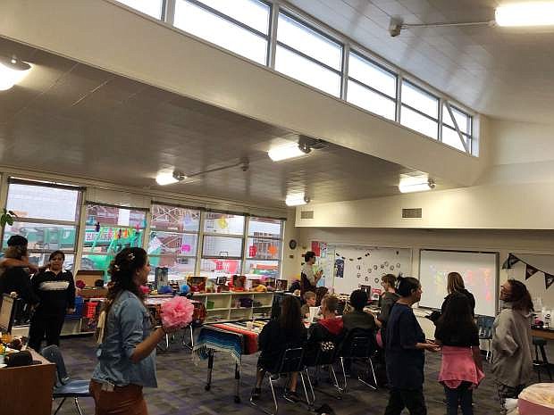 The community gathered at Pioneer High School on Nov. 1 to participate in Dias de los Muertos while enjoying students&#039; artwork, eating panes de dulces and watching Disney&#039;s movie &quot;Coco.&quot;