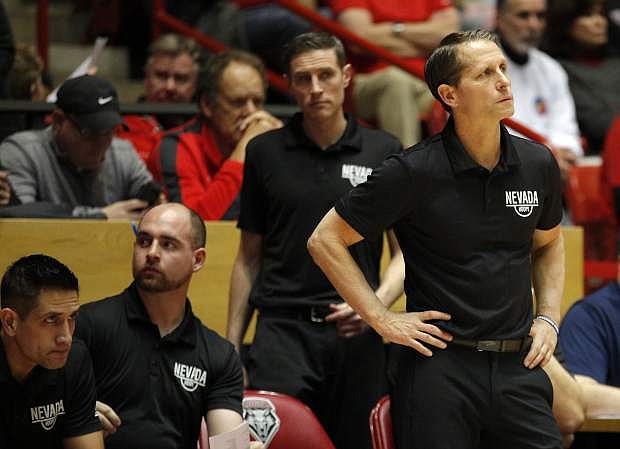 Nevada head coach Eric Musselman, right, reacts from the sideline during the second half of an NCAA college basketball game against New Mexico in Albuquerque, N.M., Saturday, Jan. 5, 2019. New Mexico won 85-58. (AP Photo/Andres Leighton)