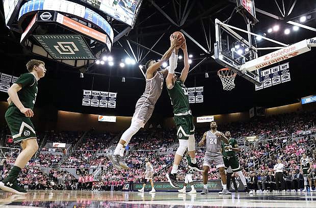 Nevada&#039;s Tre&#039;Shawn Thurman goes for the rebound against Colorado State on Wednesday.