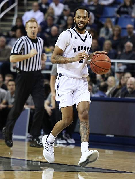 Nevada&#039;s Corey Henson surveys the floor in the Wolf Pack&#039;s conference game against San Jose State.