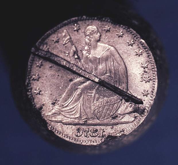 A canceled coin die featuring the image of a half-dollar was discovered during an excavation outside the Nevada State Museum, formerly the U.S. Branch Mint in Carson City.