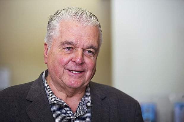 Nevada Governor-elect Steve Sisolak responds to a reporter&#039;s question following a news conference on health insurance at the Sawyer State Building in Las Vegas Friday, Dec. 14, 2018. The deadline for enrolling for health insurance through Nevada Health Link is midnight Saturday, Dec. 15. (Steve Marcus/Las Vegas Sun via AP)