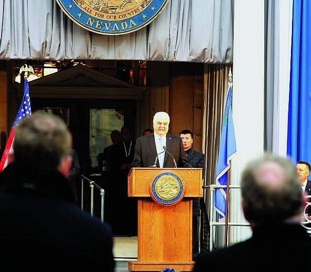 Nevada Gov. Steve Sisolak gives his inaugural address on Monday in front of the state Capitol.