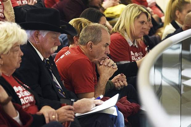 Members of a Nevada chapter of Moms Demand Action attend a hearing for Senate Bill 143 at the Nevada Legislature Building in Carson City on Tuesday.