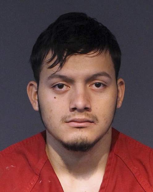 Wilber Martinez-Guzman, 20, an immigrant from El Salvador, is pictured in this booking photo provided by the Washoe County Jail in Reno. Martinez-Guzman was transferred to the jail from Carson City and was arraigned Monday, Feb. 11, 2019, in Reno Justice Court on four counts of murder in the killings last month of a couple in Reno and two other women in Douglas County.