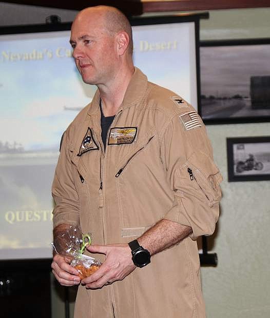 Retired Navy Capt. David Halloran addresses the monthly CEDA breakfast.