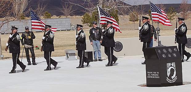 The Nevada Veterans Coalition ceremonial rifle team march into position in front of the Patriot Guard Riders at the March military service for unaccompanied remains.