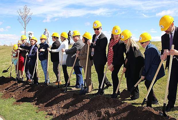 Scores of guests and veterans take part in groundbreaking ceremonies Friday for a new Nevada Veterans Memorial Plaza in Sparks.