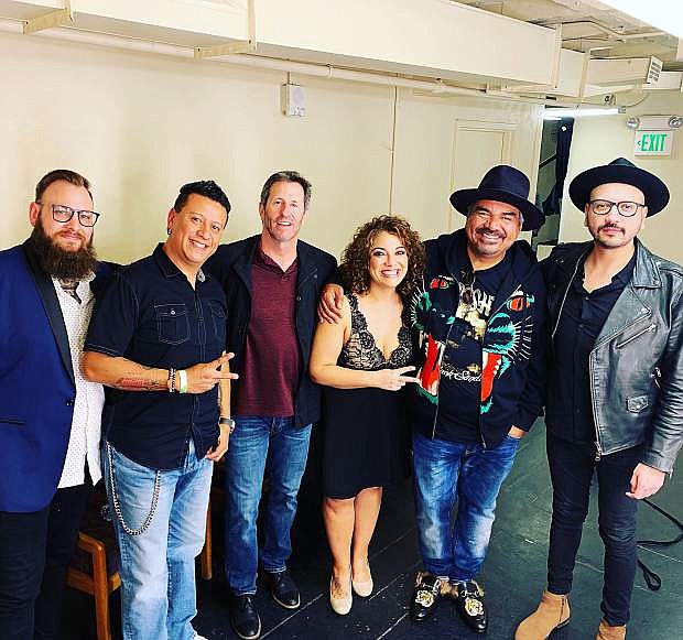 Audio Sky poses with comedian George Lopez backstage at the Bob Hope Theatre in Stockton, Calif., on March 23.
