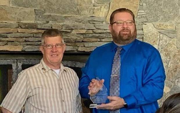 Philip Klaerner, right, displays the Liberal Arts Student of the Year from the Associated Students of Western Nevada on May 11. Next to him is WNC Fallon Mathematics Professor Timothy Mayo.