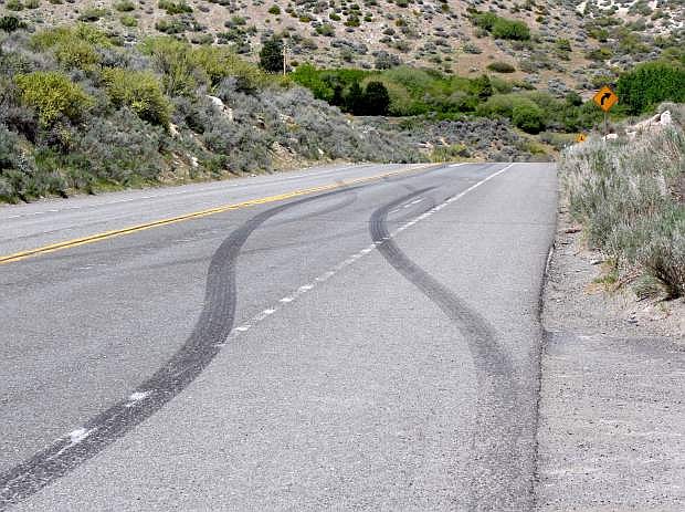 Tire tracks from a recent chase with a Bay Area murder suspect are seen on Kingsbury Grade. An investigation into the April 26 chase will close the Grade from Foothill Road to Tramway on Wednesday.
