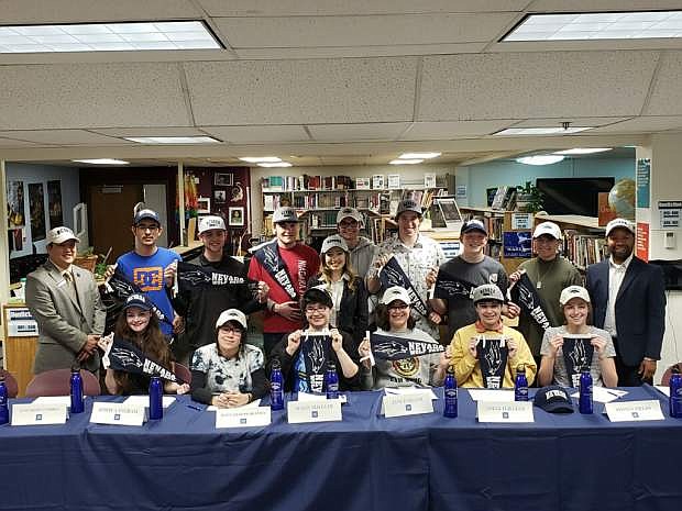 Fourteen Carson High School seniors participated in the Nevada Scholars Signing Day Wednesday in the school&#039;s library.