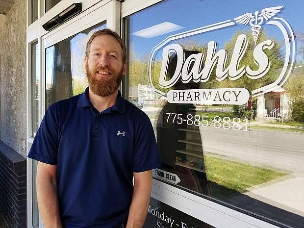 Nathan Dahl, owner, stands outside the Dahl&#039;s Pharmacy&#039;s new location in the former Mike&#039;s Pharmacy building on Curry Street. The new location opens May 13.