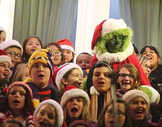 The Grinch joins Carson City fifth graders students during Friday night&#039;s Silver &amp; Snowflakes at the Capitol.