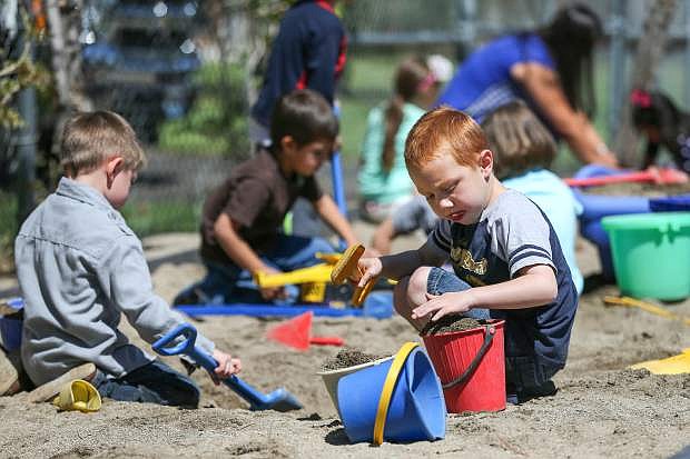 Luke Walls, 5, and fellow pre-K students play at recess at Mark Twain Elementary School in Carson City on May 26, 2015.