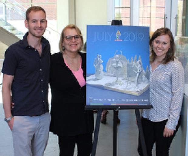 From left, John-Henry Lambin, Debbie Lambin and Rachael Lambin of Carson City show the Artown poster with their sculptures chosen as part of the &quot;Community&quot; theme for Northern Nevada&#039;s monthlong art event.